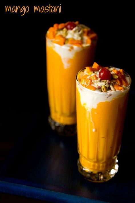 mango mastani recipe with step by step photos. mango mastani is a popular dessert drink from pune. thick mango milkshake topped with vanilla or mango ice cream. #mangomastani #mangomastanirecipe #mangoes #pune Mango Mastani, Falooda Recipe, Mango Kulfi, Mango Milkshake, Granitas, Veg Recipes Of India, Mango Dessert Recipes, Mango Dessert, Popular Desserts