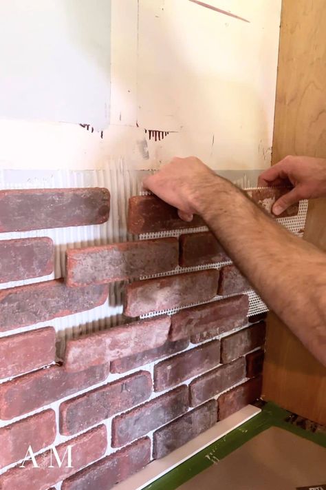 How to Install Brick Wall - Step-by-Step Instructions - Arched Manor Diy Brick Accent Wall, Diy Basement Makeover, Diy Stone Wall Interior, Brick Kitchen Wall, Brick Installation, Brick Colonial House, Wood Burning Stove Corner, Diy Stone Wall, Brick Tile Wall