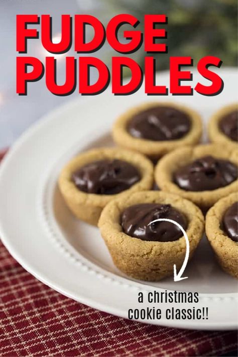 Fudge Puddles are these perfect little peanut butter cookie cups filled with a chocolate fudge filling that is absolutely delicious! If you love peanut butter cookies and chocolate together this is the sweet treat just for you! #christmascookies #cookie #peanutbuttercookie #christmascookieswap #cookieswap #holidayrecipe #christmasrecipe #cookierecipe #amandascookin Fudge Puddles, Fudge Photography, Chocolate Fudge Filling, Peanut Butter Cookie Cups, Photography Chocolate, Salted Caramel Pretzels, Fabulous Desserts, Chocolate Chip Shortbread Cookies, Toffee Cookies