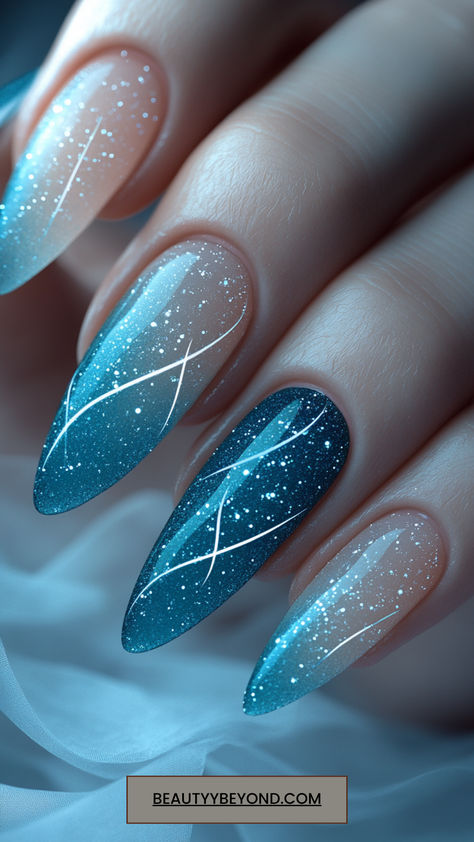 Cool off in style with these 15 frosty blue winter nail designs for 2025! Featuring icy hues, ombre finishes, and shimmering accents, these nails are perfect for embracing the chill of the season. Save this pin for stunning winter blue nail inspiration! #BlueNails #WinterChic #IcyNails Winter Nails Blue Almond, April Birthday Nails Ideas, Light Blue Sparkling Nails, White To Light Blue Ombre Nails, Sparkly Winter Nails Almond, Chrome Winter Nails 2024, Blue Art Nails, Snow Sparkle Nails, January Inspired Nails