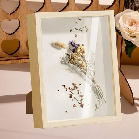 Menolana DIY Shadow Box Frame Frame, 5cm Inside Depth, Picture Frame Photo Frame for Keepsake Flower DIY Gifts Medals Decor Wood Color.This dried flower display case photo box frame is easy to fill, you can DIY unique crafts to display your favorite projects, favorite pictures, dried flowers, awards, certificates, memorabilia, awards, medals, photos, pictures, keepsakes, handicrafts, artworks, tickets, bottle caps, postcards, stamps, dolls etc.The shadow box frame is made of wood and glass, high clear glass, good picture quality and waterproof.Wood shadow box frame is 14.3cmx19.4cmx6.4cm/5.63inchx7.64inchx2.52inch (Outer Frame Size), 12.7cmx17.8cm/5.00inchx7.01inch (Inner Size), Inside Depth: 5cm/1.97inch.This deep fillable frame is good for decorating bedrooms, living rooms, cafes, bars, Diy Shadow Box Frame, Wood Frames Diy, Deep Picture, Shadow Box Picture Frames, Waterproof Wood, Diy Shadow Box, Memory Frame, Glass Display Case, Frame Ideas