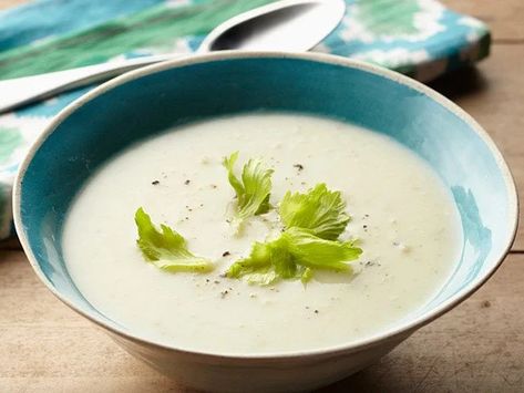 Robert Irvine's versatile soup can be served warm or chilled and dresses up everyday russet potatoes with leeks, thyme and heavy cream.