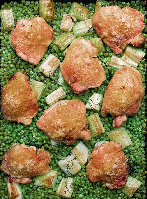 I thought I had exhausted the culinary possibilities of a pack of frozen peas, but my friend, and excellent cook, Alex Andreou, led me by the hand – it does take a leap of faith – to his method of using them, still frozen, as the first layer of a traybake. It’s a life-changer. The peas become soft and sweet in the heat – duller in colour, but so much more vibrant in flavour – and the steam they produce as they bake makes the chicken beautifully tender, its skin crackly and crisp on top. What’s k Nigella Recipes, Nigella Kitchen, Chicken Traybake, Nigella Lawson Recipes, Chicken Breast Crockpot Recipes, Crockpot Chicken Breast, Purple Potatoes, Daily Recipes, Nigella Lawson