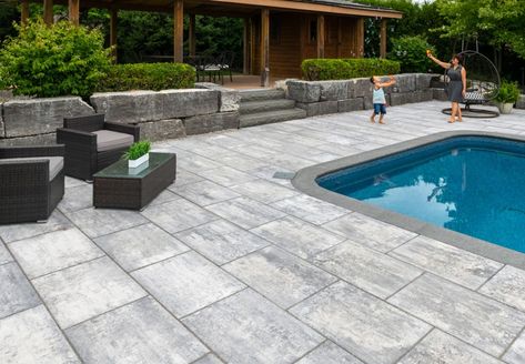 Contemporary pool deck with smooth pavers | Unilock Pool Deck Ideas Inground, Pool Deck Tile, Pool Decking Concrete, Travertine Pool Decking, Pool Deck Decorations, Inground Pool Landscaping, Pool Pavers, Travertine Pool, Pools Backyard Inground