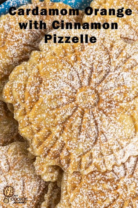 A short stack of round flat Italian cookies on a blue plate. Pizzelle Recipe Flavors, Pizzelle Crackers, Pizzelle Flavors, Peanut Butter Pizzelle Recipe, Pizelle Cookies Recipes, Lemon Pizzelle Recipe, Pizzelle Recipes, Pizelle Recipe, Pizzelle Maker