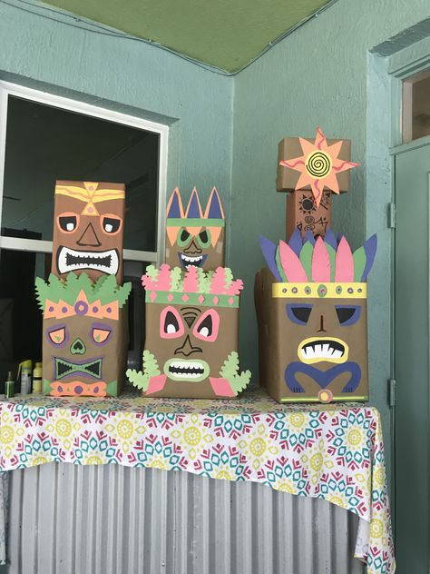 Tiki boxes Tiki Boxes, Tiki Heads Diy Boxes, Tiki Statues Diy, Tiki Boxes Diy, Luau Crafts, Survivor Theme, Diy Totem, Tiki Faces, Tiki Man