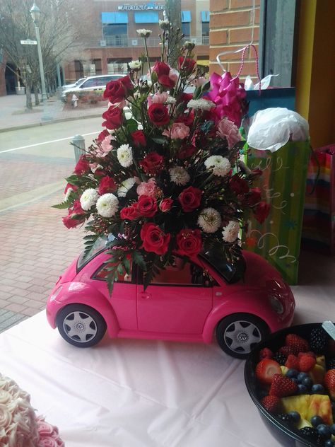 You can turn a Barbie car into a really cute flower arrangement centerpiece. This was made by my mom Fran who is a florist. Barbie Car Flower Arrangement, Barbie Inspired Flowers, Barbie Car Centerpiece, Barbie Car Floral Arrangement, Barbie Floral Arrangement, Barbie Flowers, Princess Birthday Party Decorations Diy, Barbie Pink Flower Bouquet, Car Centerpieces