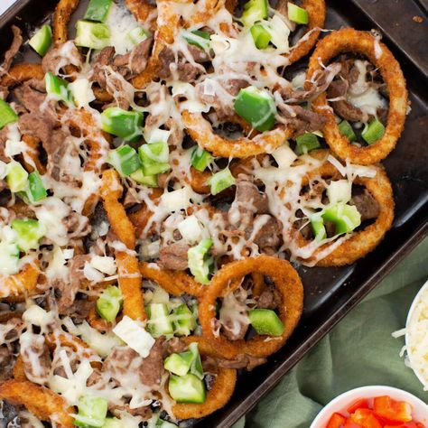 Sheet Pan Loaded Philly Cheesesteak Onion Rings Loaded Onion Rings Recipe, Cheesesteak Onion Rings, Philly Cheese Steak Onion Ring, Loaded Onion Rings, Sheet Pan Snacks, Onion Ring Casserole, Melty Mashups, Dinner Schedule, Northern Cottage