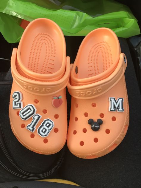 Peach Crocs, Nice Slippers, White Tennis Shoes Outfit, Crocs Aesthetic, Crocs With Charms, Crocs Collection, Crocs Ideas, Croc Style, Fun Slippers