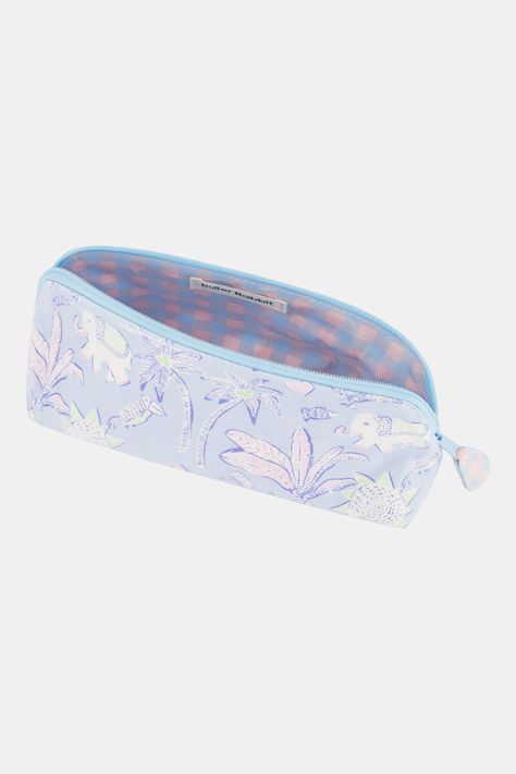 Keep your beauty essentials organized in style with the tropical motifs of our Paradise print. This zip-top makeup bag is designed with durable coated cotton canvas for wipe-clean ease. Materials and Care 100% Poly Coated Cotton Canvas Water-Resistant Wipe Clean Made in India Measurement Information Small: 8" W, 4.75" H, 2.5" D Large: 10.5" W x 6.25" H, 3.25" D Preppy Pencil Pouch, Roller Rabbit Bag, Roller Rabbit Makeup Bag, Preppy Makeup Bag, Closet Refresh, Tropical Motifs, Summer Wishlist, Top Makeup, Roller Rabbit