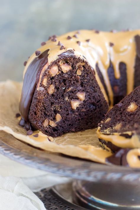 Dark Chocolate Peanut Butter Bundt Cake may be the easiest, most divine cake you will ever make. Topped with chocolate ganache and melted peanut butter. Chocolate Peanut Butter Bundt Cake, Peanut Butter Bundt Cake, Butter Bundt Cake, Cake Bundt, Dark Chocolate Peanut Butter, Icing Ideas, Chocolate Bundt, Mini Bundt, Chocolate And Peanut Butter