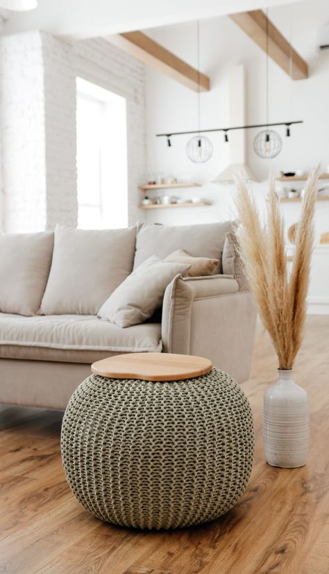 Trendy floor poufs also serve as coffee tables and ottomans, while decorative knit baskets provide ample storage... Farmhouse Coffee Tables, Coffee Table Pouf, Pouf Coffee Table, Modern Farmhouse Coffee Table, Pouf Footstool, Knitted Pouf, Unique Coffee Table, Coffee Table Farmhouse, Coastal Living Room