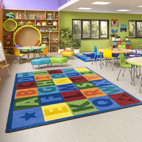 Early Learning Environments, Preschool Rooms, Preschool Classroom Decor, Uppercase Alphabet, Home Daycare, Yellow Area Rugs, Classroom Setup, Classroom Design, Learning The Alphabet