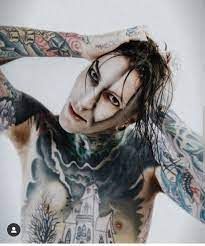 Chris Motionless' 48 Tattoos & Their Meanings – Body Art Guru Lost Boys Tattoo, Pumpkin Artwork, Metalcore Bands, Chris Motionless, Ghost Tattoo, Ronnie Radke, City Tattoo, 80s Rock, Kellin Quinn