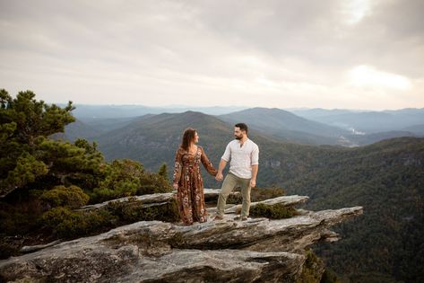 A couple holding hands during golden hour in Linville Gorge A Couple Holding Hands, Pretty Place Chapel, Craggy Gardens, Couples Travel, Wedding Day Tips, Pavilion Wedding, Mountain Engagement Photos, Couple Holding Hands, Asheville Wedding