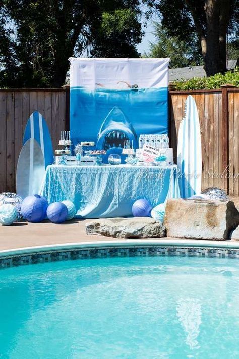 Awesome Jaws shark birthday party! See more party ideas at CatchMyParty.com! Jaws Party Decorations, Jaws Birthday Party Decorations, Jaws Birthday Party Ideas, Jaws Pool Party, Shark Week Party Decorations, Jaws Themed Birthday Party, Jaws Party Ideas, Shark Pool Party Ideas, Jaws Themed Party