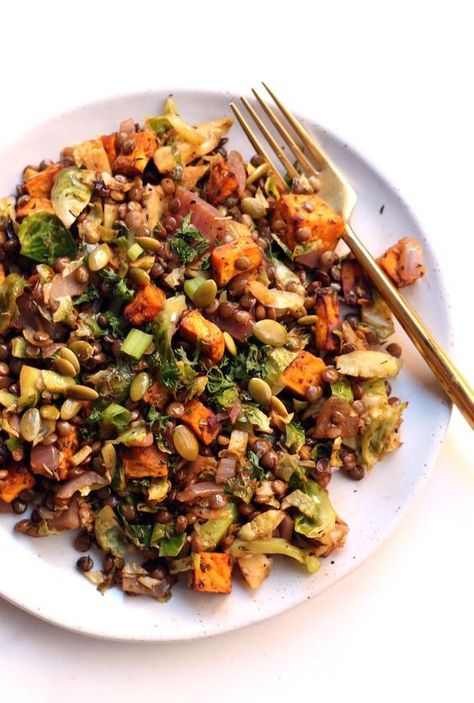 This hearty Loaded Lentil Salad is packed with protein, fiber, and warm veggies like roasted sweet potatoes, red onion, and Brussels sprouts. Perfect for a light lunch! Vegan and gluten-free. Lentil Salad Vegan, Salad Coleslaw, Lentil Salad, Lentil Recipes, Delish Recipes, Vegan Salad, Roasted Sweet Potatoes, Brussels Sprouts, Sweet Potatoes