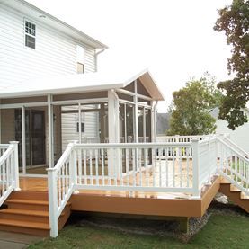 Deck Ideas & Designs | Pictures & PhotoGallery | Decks.com by Trex Ground Level Deck, Building Design Plan, Deck Pictures, Dream Deck, Deck Construction, Deck Designs Backyard, Deck Stairs, Trex Deck, Deck Builders