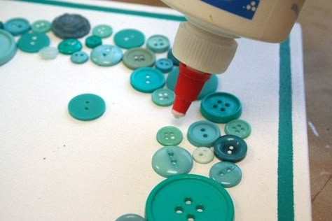 Using craft glue to glue down buttons to a canvas Button Canvas Art, Christmas Button Art, Christmas Button Crafts, Button Tree Art, Button Art On Canvas, Diy Button Crafts, Vintage Buttons Crafts, Button Craft Ideas, Diy Crafts Easy At Home