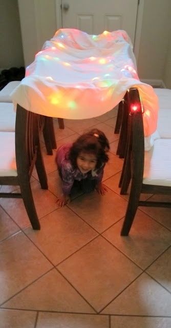 Create a holiday tunnel/fort. | 32 Super Fun Ways For Kids To Keep Busy This Holiday Season Winter Activities For Toddlers, Activities For Toddlers, Boredom Busters, Indoor Fun, Rainy Day Activities, Toddler Fun, Toddler Christmas, Winter Fun, Winter Activities