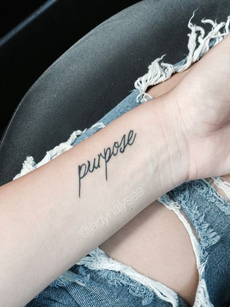 Purpose tattoo.. #purpose #tattoo #cursive #word #wrist #pretty Find Your Purpose Tattoo, Purpose Tattoo Ideas, Perseverance Tattoo, Purple Tattoo Ink, Purpose Tattoo, Tattoo Cursive, Tattoos That Mean Something, Hourglass Tattoo, Cursive Tattoos