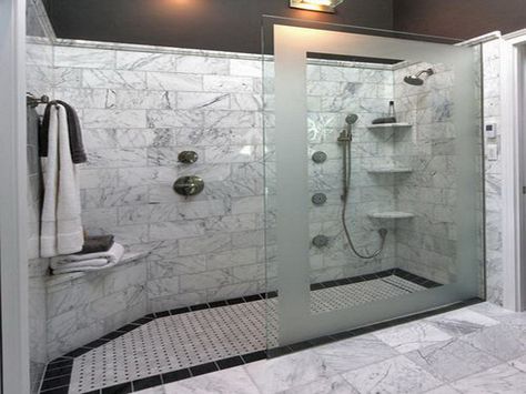 Here's a large walk-in shower that has no doors, only a decorative privacy wall, along with a built-in bench and niche. Description from trilitebuilders.com. I searched for this on bing.com/images Doorless Shower Design, Doorless Shower, Shower Stalls, Small Bathroom With Shower, Walk In Shower Designs, Dream Shower, Bathroom Shower Design, Bathroom Shower Tile, Bathroom Remodel Shower