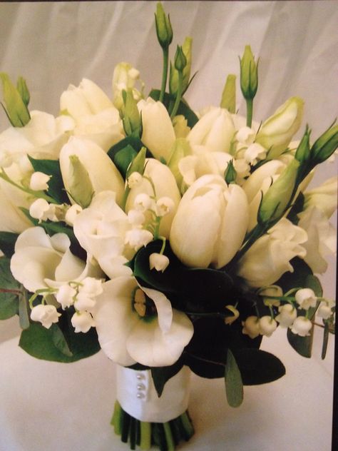 Tulip, lissianthus, lily of the valley and eucalyptus wedding bouquet. Made by Helen Stevens. Tulip Wedding Bouquet, White Lily Of The Valley, Eucalyptus Wedding Bouquet, Tulip Wedding, Lily Bouquet, Tulip Bouquet, White Lily, Eucalyptus Wedding, White Tulips