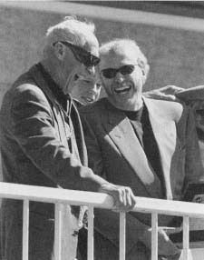 Nike CEO Phil Knight (right) shares a laugh with his former University of Oregon coach and Nike cofounder Bill Bowerman. Reproduced by permission of AP/Wide World Photos. Bill Bowerman, Phil Knight, Two Guys, University Of Oregon, Wide World, World Photo, Track And Field, Oregon, Mood Board