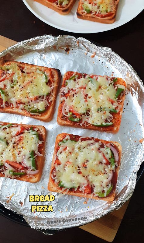 Bread Pizza in Oven | Bread pizza with instant pizza sauce | Bread pizza recipe - Abu's Cookbook Pizza With Bread Slices, Pizza On Bread Slice, Pizza With Bread, Pizza In Oven, Recipes With Bread Slices, Oven Baked Bread, Oven Baked Pizza, Bread Pizza Recipe, Pizza Bread Recipe