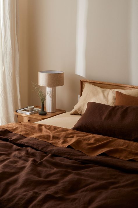 Transform your bedroom into a haven of comfort with our 100% linen bedding. Crafted from European flax and pre-washed for superior softness and durability, available in a stylish range of modern colors. Warm Bedroom Aesthetic, Brown Bedding, Bedroom Ottoman, Pure Linen Bedding, Linen Bed Sheets, Warm Bedroom, Air Bnb, Linen Bedroom, Studio Apartment Decorating