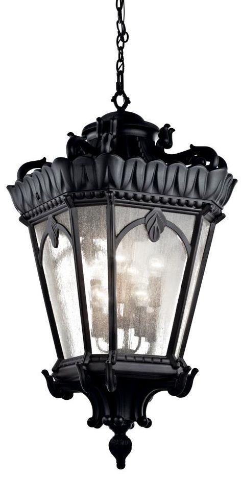 The Tournai™ 47.5\" 8 Light outdoor pendant light features an ornate look with its clear seeded glass and Textured Black finish. The Tournai wall light works in a traditional environment. Cleaning instructions: Turn off electric current before cleaning. Clean metal components with a soft cloth moistened with a mild liquid soap solution. Wipe clean and buff with a very soft dry cloth. Under no circumstances should any metal polish be used, as its abrasive nature could damage the protective finish Cottage Light Fixtures, Drop Ceiling Lighting, Cottage Lighting, Lantern Pendant Lighting, Decor Lights, Light Hanging, Outdoor Pendant Lighting, Lighting Decor, Londonderry