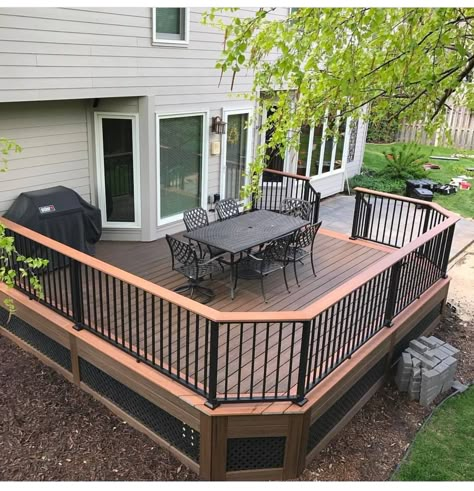 Dark Deck With Black Railing, Wood Deck Designs Back Porches, Front Deck Railing Ideas, Drop Down Deck Ideas, Brown And Black Deck Ideas, Brown Deck Decorating Ideas, Dark Brown And Black Deck, Gray Deck With Black Railing Wood, Backyard Decks