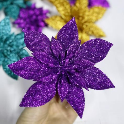 PRICES MAY VARY. Quality Glitter Poinsettia Flowers.The glitter won't fall off easily for our flowers(Green steel stems are included seperately along with the flower). Width: 6 inch Package includes:12 pcs Purple These poinsettia are so beautiful and elegant. Perfect for christmas decorations, adding to wreaths, centerpieces, placing on your christmas tree. These poinsettias are so beautiful and elegant. Perfect for mantle decorations,Christmas wreath,rattan,wedding decorations,room decorations, Wreath Rattan, Purple Christmas Tree Decorations, Rattan Wedding, Snowflake Tutorial, Mantle Decorations, Holiday Floral Arrangements, Poinsettia Decor, Purple Christmas Tree, Poinsettia Flowers