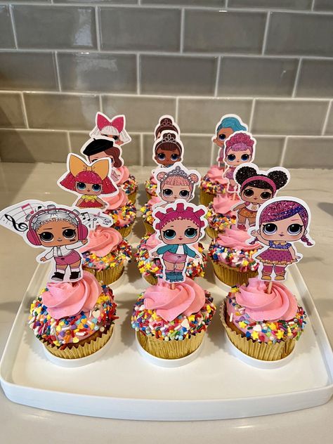 Lol Surprise Cupcakes Cupcakes topped with buttercream and sprinkles and a paper cupcake topper Lol Surprise Cupcakes Ideas, Lol Surprise Dolls Cupcakes, Lol Birthday Cupcakes, Lol Doll Cupcakes, Lol Doll Cupcake Ideas, Lol Surprise Cupcakes, Lol Cupcake Ideas, Lol Birthday Cake Ideas, Lol Theme Cake