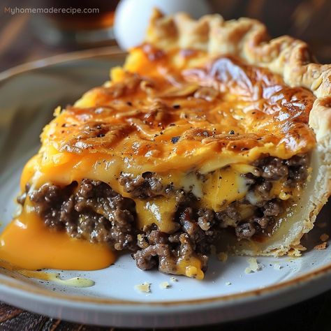 Enjoy a comforting slice of Pioneer Woman Cheeseburger Pie, made with ground beef, cheddar cheese, and a simple Bisquick batter. Sausage Pie Recipe, Sausage Pie, Cheeseburger Pie, Burger Toppings, Pizza Burgers, Breakfast For Dinner, Breakfast Dessert, Pioneer Woman, 1 Pound