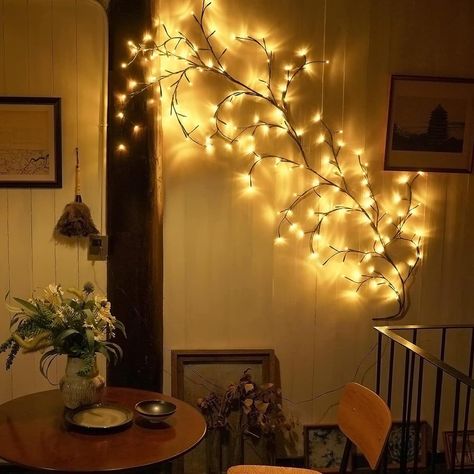 PRICES MAY VARY. SUITABLE FOR A VARIETY OF SCENES: The willow vine lights for wall is approximately 7.5 ft long and features 144 non-glaring lights. The rope is 6.4 ft long and is perfect for home decoration, creating a charming and cozy atmosphere. Vine lights for bedroom great for walls, bedrooms, fireplaces, festive Christmas decorations. DIY & PERFECT GIFTS: Flexible yet strong branches allow the vine to be easily bent and shaped to suit your decorative needs. You can also add some fake flow Photo Display Bedroom, Branch Lights, Wall String Lights, String Lights In The Bedroom, Lighted Branches, Halloween Christmas Decorations, Led Tree, Rattan Lamp, Light Photo