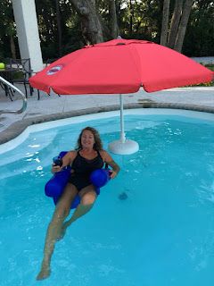 How to build a Floating Pool Umbrella....CHEAP!: Follow these instructions to build a floating pool umbrella on the cheap! Diy Above Ground Pool Landscaping, Pool Deck Decor, Pool Canopy, Pool Umbrella, Pool Float Storage, Diy Above Ground Pool, Pool Shade, Pool Storage, Deck Decor