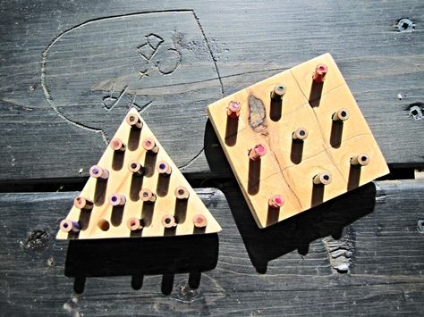 make your own peg games out of scrap wood and colored pencils. Fun easy project for an adult and child to do together.  Tic tac toe game and IQ game instructions.  http://indietutes.blogspot.com/2014/06/peg-games.html Peg Game, Iq Games, Wooden Board Games, Strep Throat, Games Diy, Tic Tac Toe Game, Diy Games, Cracker Barrel, Tic Tac Toe