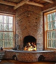 Rounded opening of corner fireplace w/ curved hearth/flowing stonework ~ very cool. Design Camino, Storybook Cottage, Corner Fireplace, Log Cabin Homes, Home Fireplace, In The Corner, Brick Fireplace, Brick And Stone, Fireplace Design