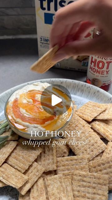 Nicolle | Cheese, Wine, Easy Appetizers & Recipes on Instagram: "RECIPE HERE ✨⬇️
 
Hot honey whipped goat cheese dip with Triscuit crackers 🌶️🧀 #ad
 
An easy dip you’ll be making on REPEAT! @mikeshothoney adds a kick to this dip which pairs perfectly with @triscuit crackers. I’m using their original because the sea salt and crunch pair fabulously with this whipped dip! 
 
What you’ll need:
 
🧀 8oz plain goat cheese log 
🧀 3-5 tbsp @mikeshothoney 
🧀 1 tbsp fresh sage cut up 
🧀 @triscuit crackers
 
Add your room temperature goat cheese log, hot honey and fresh sage to a food processor and whip until smooth. TIP✨ If your goat cheese log is cold you might want to add a bit of olive oil in the food processor to make it blend better. Add whipped goat cheese to a bowl. Microwave 1 tbsp of h Whipped Dip, Whipped Goat Cheese Dip, Honey Whipped Goat Cheese, Easy Appetizers Recipes, Goat Cheese Log, Goat Cheese Dip, Cheese Log, Whipped Goat Cheese, Easy Dip