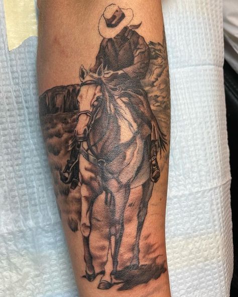 Tats Ideas Men, Black And Grey Cowboy Tattoo, Men’s Tattoos Unique, Rodeo Tattoos Cowboys, Western Upper Arm Tattoos, Cowboy Boot Tattoo Men, Cowboy Scene Tattoo, Cowboy Theme Tattoo Sleeve, John Wayne Inspired Tattoos