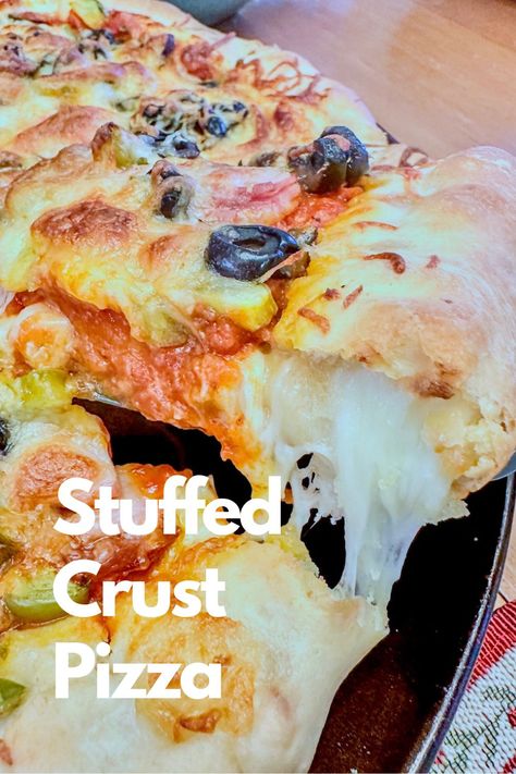 A slice of pizza with melted cheese inside the crust on a pizza pan. Pizza Stuffed Crust, Stuffed Pizza Crust, Stuffed Crust Pizza, White Pizza Sauce, Cheese Crust Pizza, Parmesan Pizza, Stuffed Pizza, Layered Bean Dip, Stuffed Crust