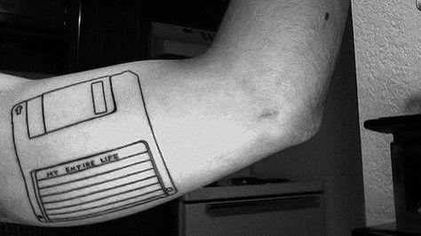 15 Vintage Tech Tattoos That Wont Ever Go Out of Style Tech Tattoo, Full Tattoo, David Shrigley, Movie Tattoos, Blackout Tattoo, Body Is A Temple, Scottish Artists, Floppy Disk, Geek Out