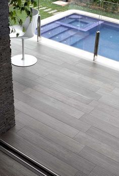 Wood look tiles around pool maybe Timber Look Tiles, Outdoor Flooring Options, Timber Tiles, Moderne Pools, Swimming Pool Decks, Modern Pool, Casa Country, Patio Tiles, Modern Pools