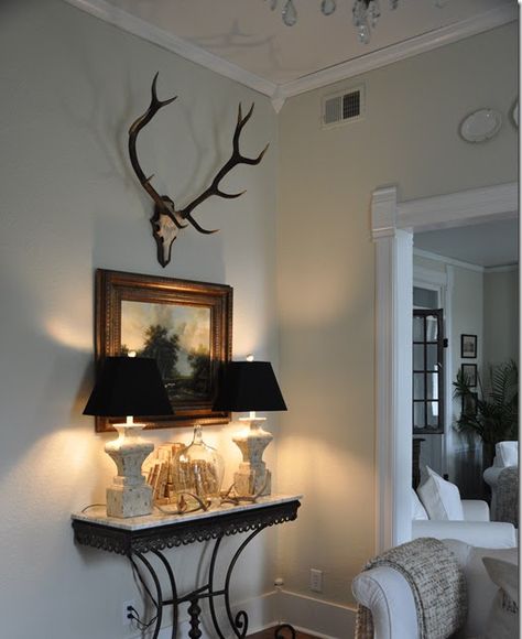 It would seem not only do I have a “thing” for mirrors but I have a thing for “cows” as well. I decided to snap a few pics of the oil pain... Dear Mount Decor, Duck Mounts In Living Room, Antlers On Wall, Deer Mount Wall Arrangement, Deer Antler Wall Decor, Deer Mount Decor, Antler Mounts, Til The Cows Come Home, Decorating With Antlers