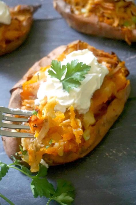 Baked Chicken-Stuffed Sweet Potatoes with mozzarella and spring onions, a healthy Fall appetizer that can be enjoyed all year round. Super simple to make, these stuffed sweet potatoes can also be served as a meal on their own. Top them with a dollop of sour cream or Greek yogurt, and you get one delicious dish. Sweet Potato Appetizers, Best Thanksgiving Appetizers, Fall Appetizer, Stuffed Sweet Potato, Potato Appetizers, Stuffed Sweet Potatoes, Fall Appetizers, Thanksgiving Dinner Recipes, Chicken Stuffed