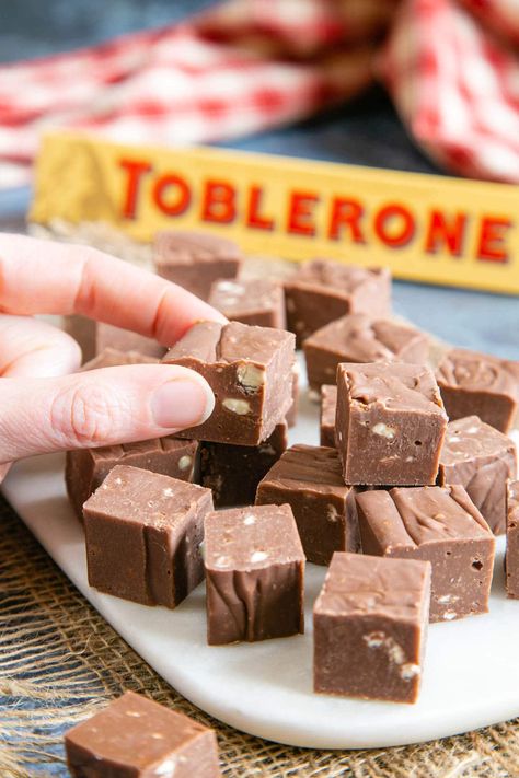 Learn how to make this easy, delicious, melt-in-the-mouth Toblerone fudge that needs only two ingredients! No boiling pans and no sugar thermometer needed. Make this easy chocolate fudge recipe in the microwave, slow cooker or a pan on the stove top. |best fudge recipe| how to make fudge| #choclate #dessert Easy Chocolate Fudge Recipe, Best Fudge, Best Fudge Recipe, Toblerone Chocolate, Chocolate Fudge Recipe, How To Make Fudge, Easy Chocolate Fudge, Easy Fudge, Microwave Fudge