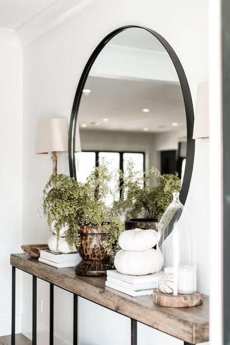 Our version of a fall entry way with decor that isn't too over the top and a little more neutral! | Entry Styling | Design, Styling, and Photography by Public 311 Design | #circlemirrorentryway #modernfarmhouseentry #entrywaydecor #entrytabledecorideas #stackingcoffeetablebooks #entrystylingforfall #fallentrywaydecor #neutralfallentrywayideas Table In Foyer, Mirror Entry Way, Tiny Hallway, Mirror Entry, Fall Entryway Decor, Fall Entry, Entry Way Decor, Entry Styling, Entry Table Decor