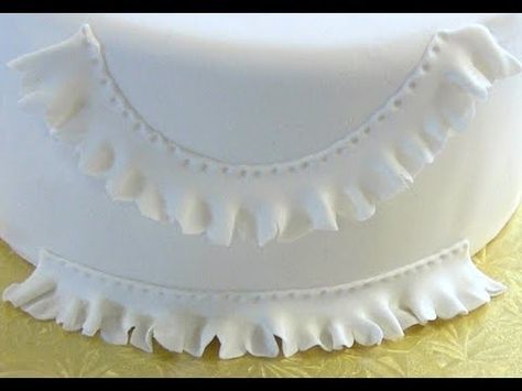 http://www.CakeSuppliesPlus.com for cake photos and supplies in video.   Like us on facebook at http://www.facebook.com/CakeSuppliesPlus  Cake Decorating: How to Make Fondant Ruffles or Fondant Frills or Gum Paste (Gumpaste) Ruffles or Frills Fondant Ruffles, Fondant Techniques, Decorator Frosting, Ruffle Cake, Fondant Tutorial, Gum Paste Flowers, Fondant Decorations, Fondant Flowers, Cake Videos