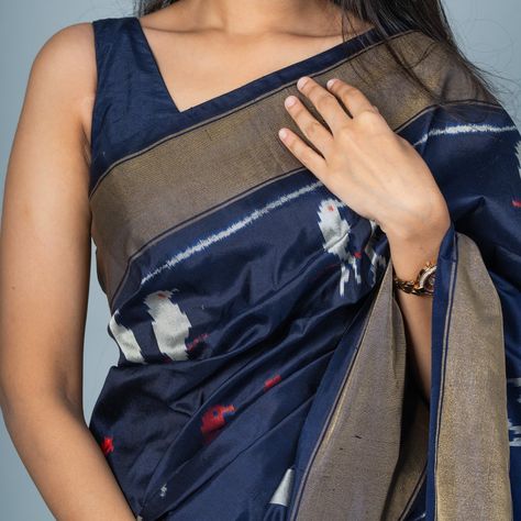 Ikat This Navy Blue Ikat Silk Saree is adorned with parrot patterns intricately woven across the body, paired with a subtle self-border. [Summer Collection, Ikat silk saree, Tulsi Silks, Tulsi, Tulsi Weaves, Ikat Pattu, Pure Silk Sarees, Handwoven silk saree, Trending silk saree, Ikat sarees, Handwoven Ikat] Saree Trending, Tulsi Silks, Pure Silk Sarees, Pure Silk, Silk Saree, Summer Collection, Silk Sarees, Parrot, Hand Weaving